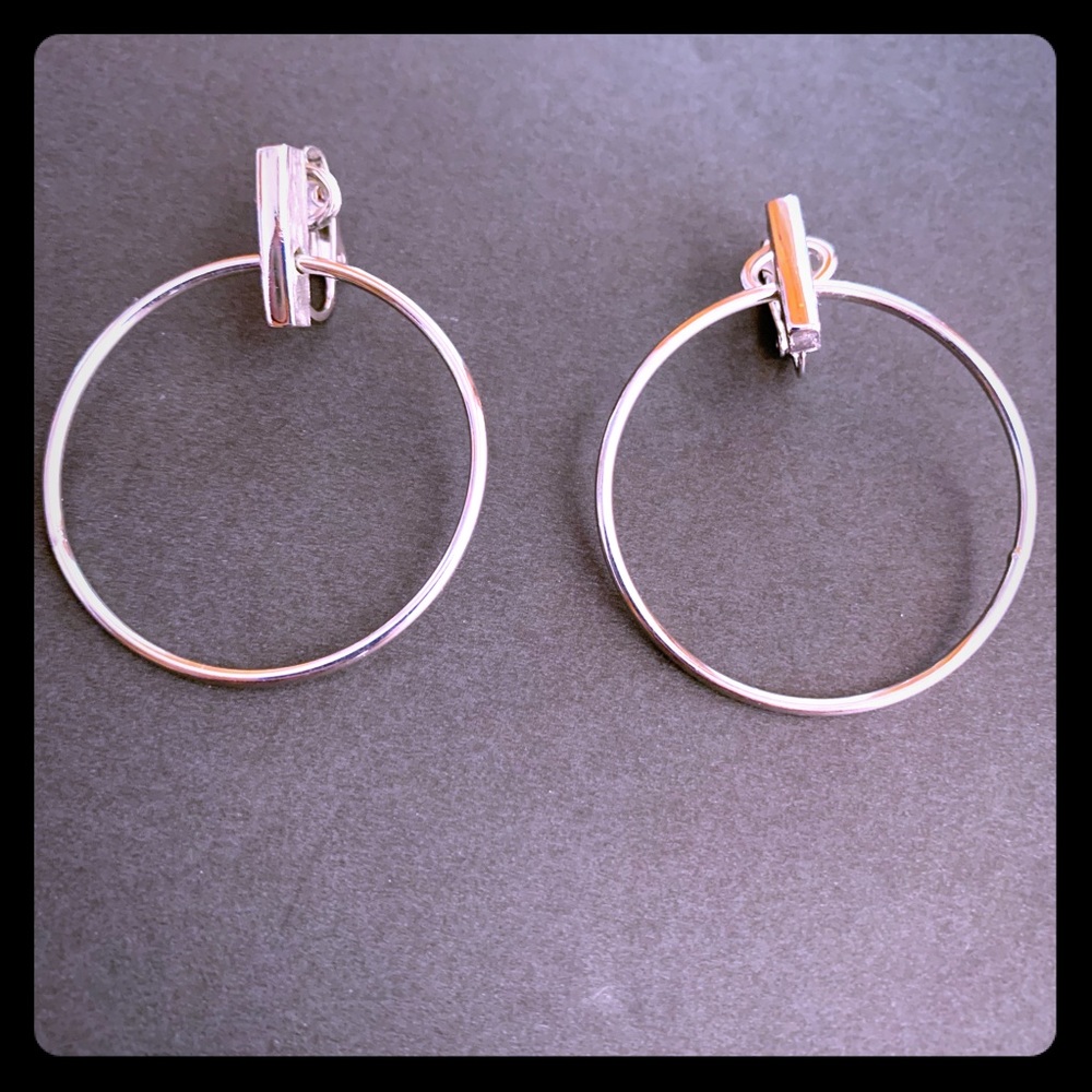 Retro Trifari Silvertone hoop earrings. Clip on